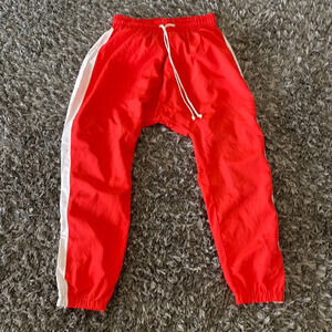 Red nylon drop crotch joggers fully lined